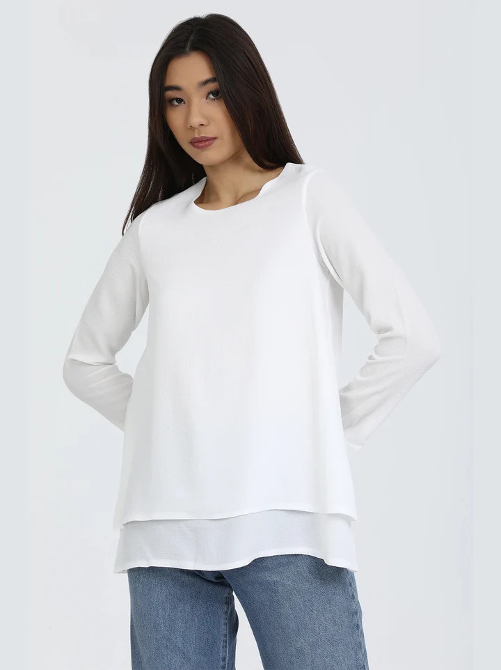 Versatile and Classic: The Long Sleeve Sheer White Blouse