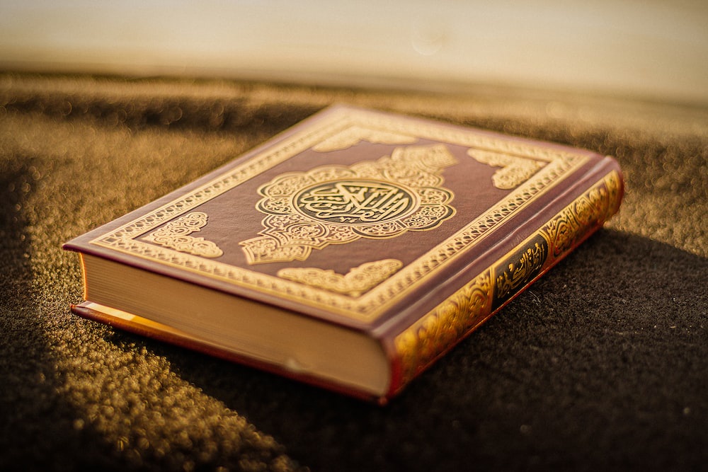 What religion uses the Quran?