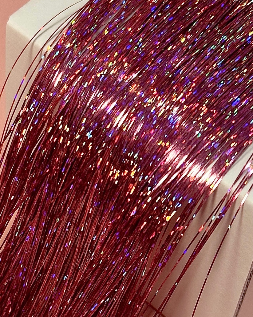 Glamour and Glitter: Exploring the History and Styles of Hair Tinsel