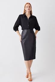 The Timeless Elegance of a Unique Design: The Black Veg Tan Leather Pencil Skirt