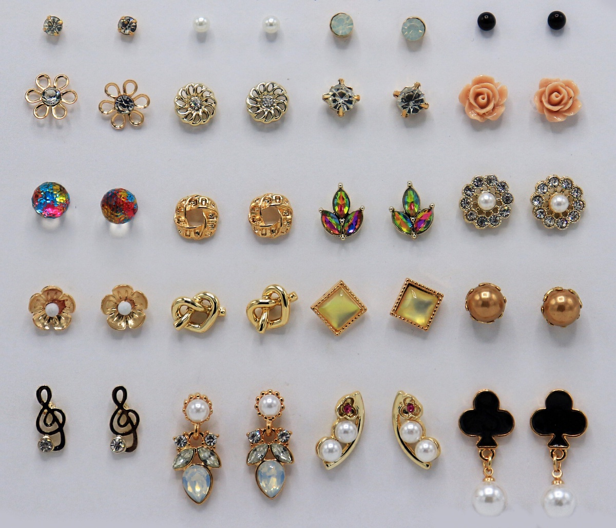 Exploring the Timeless Charm of Diamond Drop Earrings, Fish Hook Earrings, and Gold Stud Earrings: