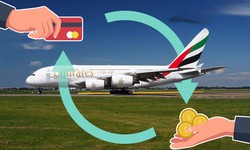 How much does it cost to upgrade to Emirates Business Class?