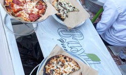 Behind the Dough: The Art of Crafting Pizza at Pizza Station