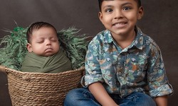 Making Memories: The Importance of Sibling Snuggle Photos in Newborn Photography