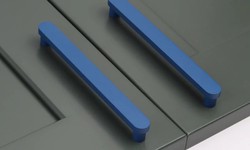 Refreshing Touches: Integrating Green Drawer Pulls and Unique Cabinet Pulls for a Modern Bathroom