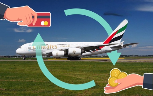 How much does it cost to upgrade to Emirates Business Class?